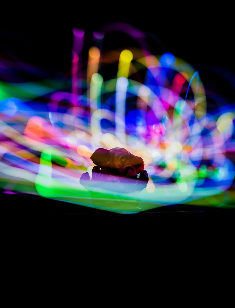 A close up of a lit object in the dark
